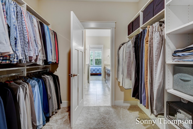 3912 Preserve Dr NE Unit 44, Belmont, MI 49306 - walk in closet featuring light colored carpet