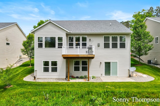 3912 Preserve Dr NE Unit 44, Belmont, MI 49306 - back of house featuring a yard, a patio, and a shingled roof