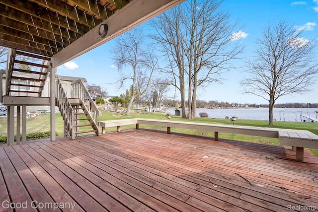 3501 Mann Rd, Clarkston, MI 48346 - wooden terrace featuring stairs, a water view, and a lawn