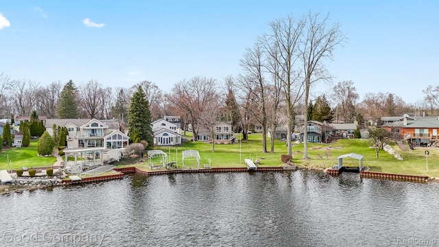 3501 Mann Rd, Clarkston, MI 48346 - water view featuring nearby suburban area and a boat dock