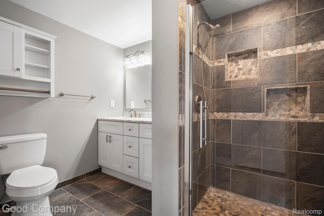3501 Mann Rd, Clarkston, MI 48346 - full bathroom with vanity, a tile shower, baseboards, and toilet