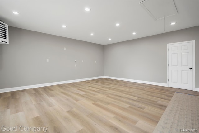 3501 Mann Rd, Clarkston, MI 48346 - empty room with light wood-style floors, recessed lighting, baseboards, and attic access