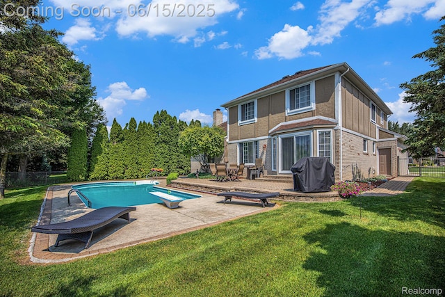 16096 Violet Dr, Macomb, MI 48042 - view of swimming pool featuring area for grilling, a diving board, a patio, and entry steps