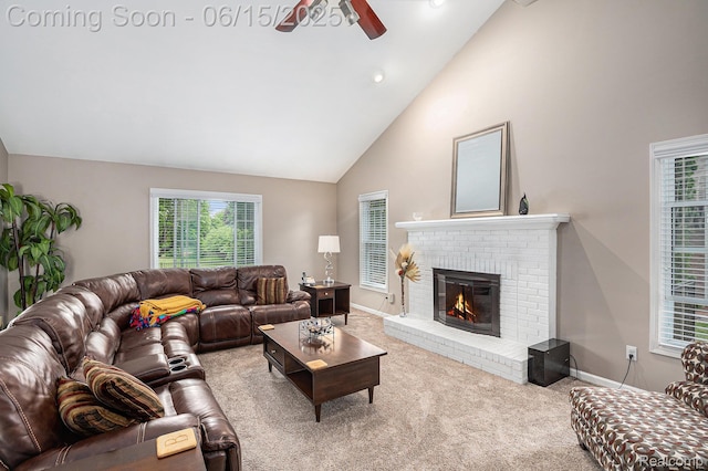 16096 Violet Dr, Macomb, MI 48042 - carpeted living area featuring a ceiling fan, a fireplace, plenty of natural light, and high vaulted ceiling