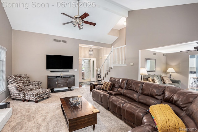16096 Violet Dr, Macomb, MI 48042 - carpeted living room featuring ceiling fan, stairway, high vaulted ceiling, and beam ceiling