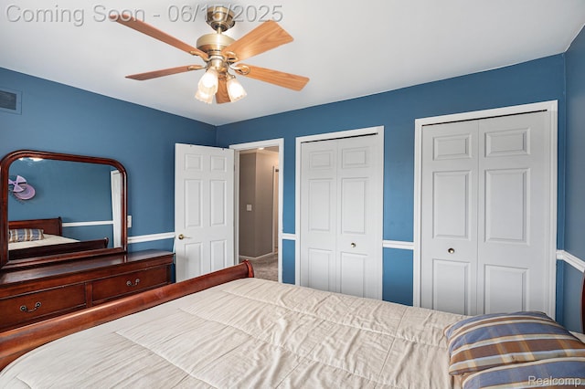 16096 Violet Dr, Macomb, MI 48042 - bedroom featuring multiple closets and ceiling fan