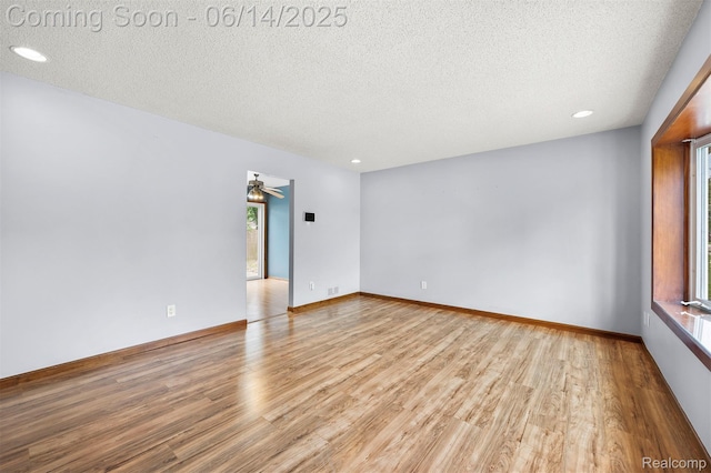 23312 Shoreview St, Saint Clair Shores, MI 48082 - unfurnished room featuring light wood-style flooring, a textured ceiling, recessed lighting, and ceiling fan