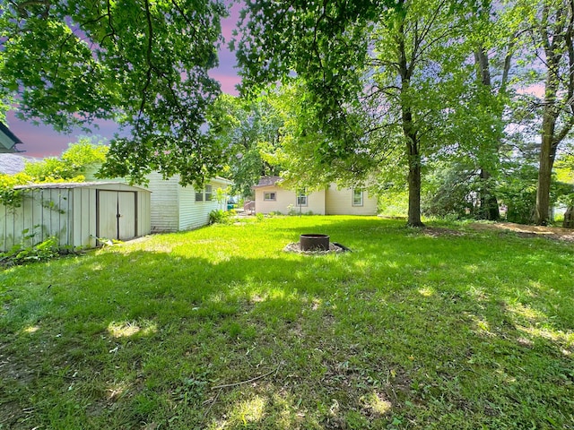 315 E Spruce St, Marshall, MI 49068 - view of green lawn featuring a fire pit