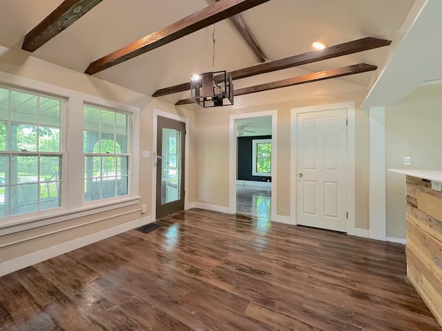 315 E Spruce St, Marshall, MI 49068 - unfurnished dining area with baseboards, ceiling fan, and dark wood-style floors