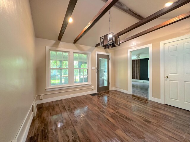 315 E Spruce St, Marshall, MI 49068 - unfurnished dining area featuring wood finished floors, a chandelier, baseboards, and a ceiling fan