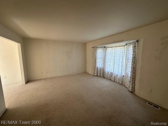 5936 Meadowview St, Ypsilanti, MI 48197 - spare room featuring light colored carpet