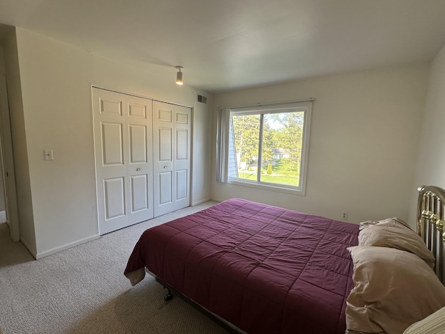 3626 Lakeshore Dr Unit K10, Saint Joseph, MI 49085 - carpeted bedroom with a closet and baseboards