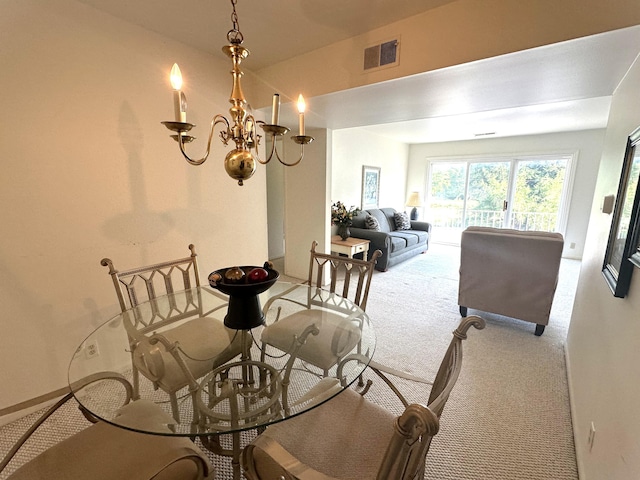 3626 Lakeshore Dr Unit K10, Saint Joseph, MI 49085 - carpeted dining area with a chandelier