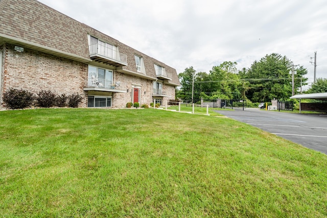 3626 Lakeshore Dr Unit K10, Saint Joseph, MI 49085 - view of building exterior with uncovered parking