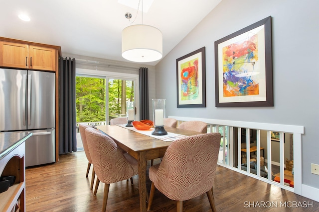 3348 Clearview Ln, Saugatuck, MI 49453 - dining area featuring lofted ceiling and wood finished floors