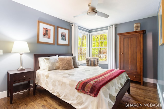 3348 Clearview Ln, Saugatuck, MI 49453 - bedroom with wood finished floors, baseboards, and a ceiling fan
