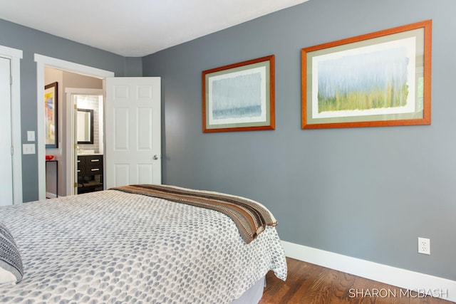 3348 Clearview Ln, Saugatuck, MI 49453 - bedroom with dark wood-style flooring and baseboards
