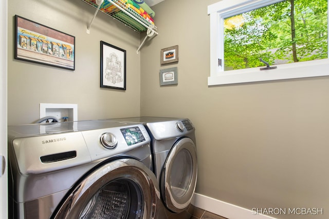 3348 Clearview Ln, Saugatuck, MI 49453 - washroom with independent washer and dryer and baseboards