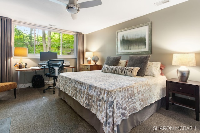 3348 Clearview Ln, Saugatuck, MI 49453 - carpeted bedroom with a desk and a ceiling fan