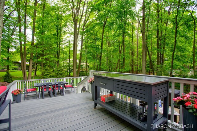 3348 Clearview Ln, Saugatuck, MI 49453 - wooden deck featuring outdoor dining area