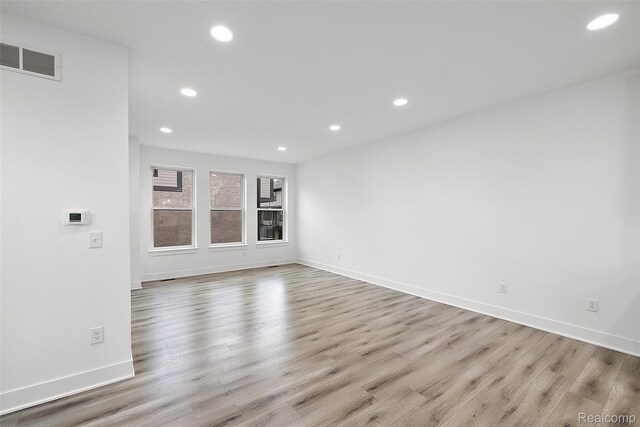 2813 Summers Pl, Troy, MI 48084 - spare room with recessed lighting, wood finished floors, and baseboards