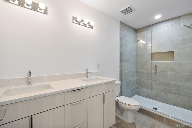 2813 Summers Pl, Troy, MI 48084 - bathroom featuring a stall shower, double vanity, toilet, and tile patterned flooring