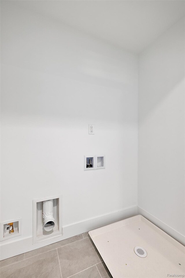 2813 Summers Pl, Troy, MI 48084 - laundry room with hookup for a washing machine, tile patterned floors, and baseboards