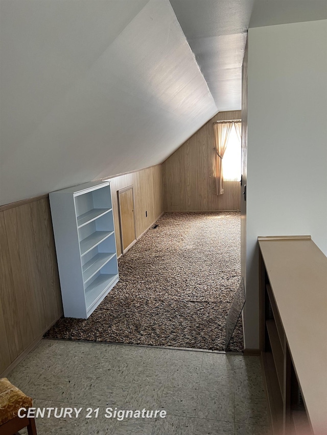 1613 Waldman Ave, Flint, MI 48507 - additional living space featuring wooden walls and lofted ceiling