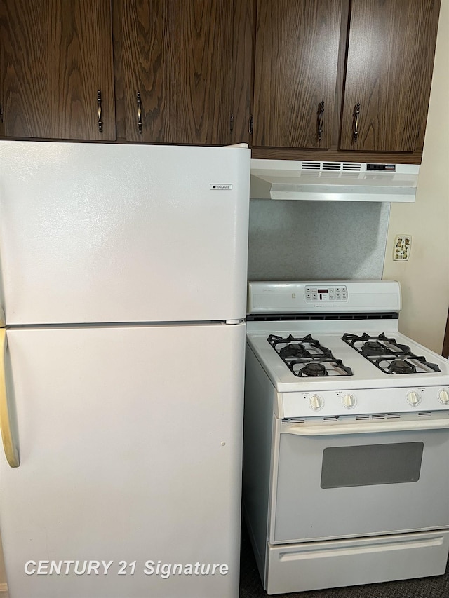 1613 Waldman Ave, Flint, MI 48507 - kitchen with white appliances, under cabinet range hood, dark brown cabinets, and light countertops