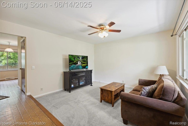 5045 Bronco Dr, Clarkston, MI 48346 - living room featuring baseboards and ceiling fan
