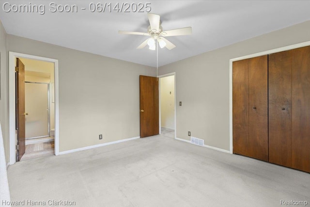 5045 Bronco Dr, Clarkston, MI 48346 - unfurnished bedroom featuring light carpet, a closet, connected bathroom, and ceiling fan