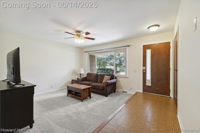 5045 Bronco Dr, Clarkston, MI 48346 - carpeted living area with a ceiling fan and baseboards