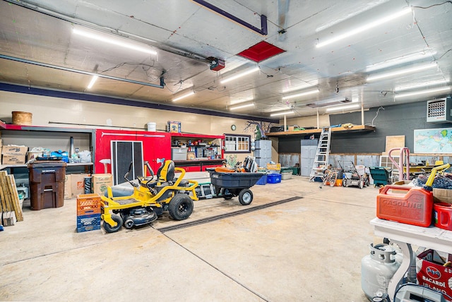 731 13 Mile Rd NW, Sparta, MI 49345 - garage with a workshop area and a heating unit