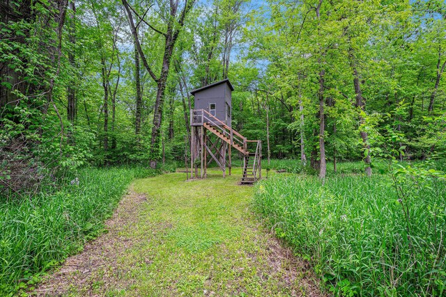 731 13 Mile Rd NW, Sparta, MI 49345 - view of yard featuring stairway