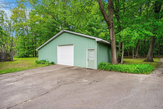 731 13 Mile Rd NW, Sparta, MI 49345 - detached garage with asphalt driveway