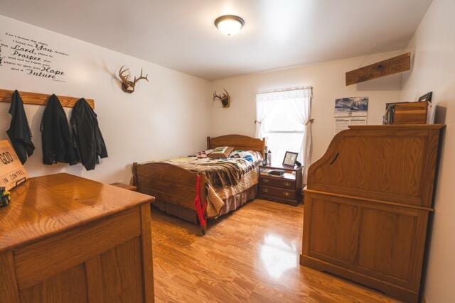 14656 Hersey Rd, Hersey, MI 49639 - bedroom featuring light wood-style flooring