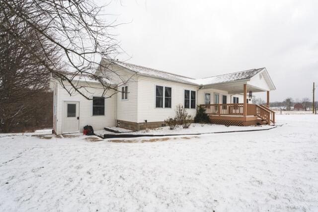 14656 Hersey Rd, Hersey, MI 49639 - view of snow covered back of property