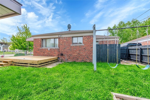 26500 Grant St, Saint Clair Shores, MI 48081 - rear view of house with brick siding and a deck