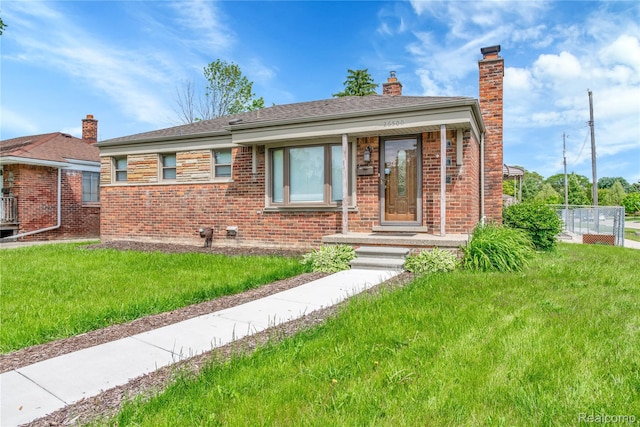 26500 Grant St, Saint Clair Shores, MI 48081 - bungalow with brick siding and a chimney