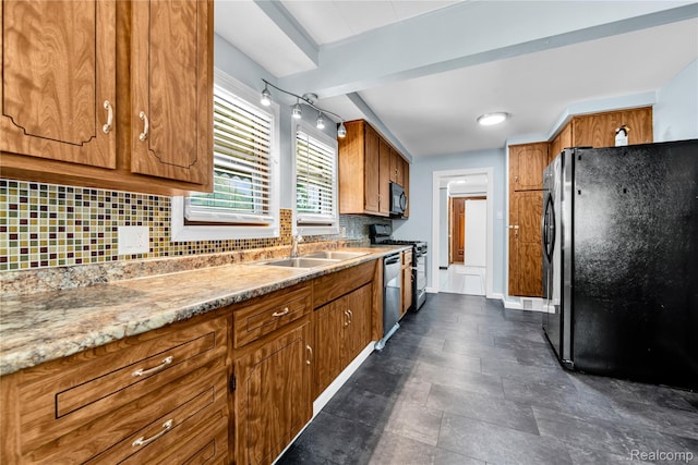 26500 Grant St, Saint Clair Shores, MI 48081 - kitchen with fridge with ice dispenser, black microwave, range, brown cabinets, and stainless steel dishwasher