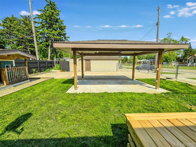 26500 Grant St, Saint Clair Shores, MI 48081 - view of yard with an outdoor structure, a patio, and a detached carport