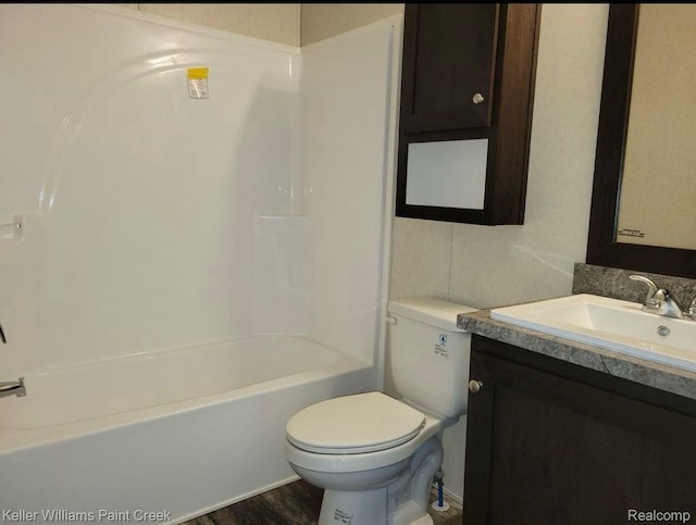 16196 Notre Dame, Clinton Township, MI 48038 - bathroom featuring vanity, toilet, shower / bath combination, and wood finished floors