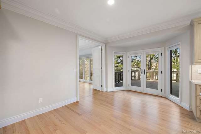 3013 Heron Pl, Bloomfield Hills, MI 48302 - empty room featuring crown molding, french doors, baseboards, light wood finished floors, and recessed lighting