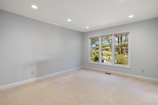 3013 Heron Pl, Bloomfield Hills, MI 48302 - empty room featuring recessed lighting, baseboards, and light tile patterned floors