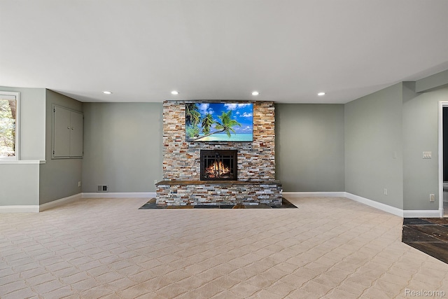 3013 Heron Pl, Bloomfield Hills, MI 48302 - unfurnished living room featuring a stone fireplace, recessed lighting, and baseboards
