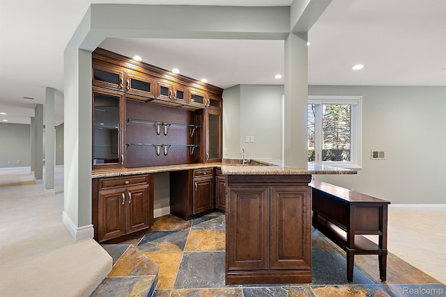 3013 Heron Pl, Bloomfield Hills, MI 48302 - indoor wet bar with stone finish flooring, recessed lighting, and baseboards
