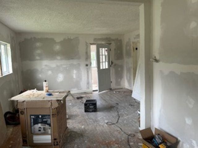 2602 Sloan St, Flint, MI 48504 - foyer entrance featuring a textured ceiling