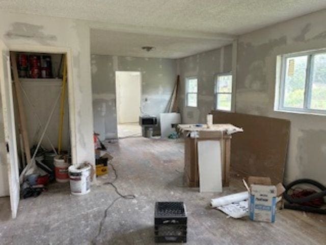 2602 Sloan St, Flint, MI 48504 - misc room featuring healthy amount of natural light and a textured ceiling