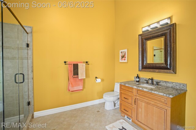 15496 Bealfred Dr, Fenton, MI 48430 - full bathroom featuring toilet, vanity, a shower stall, baseboards, and tile patterned flooring