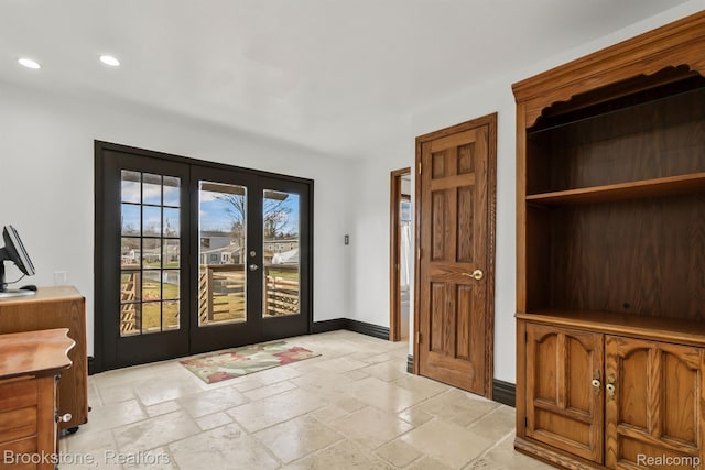 2995 Venice, Highland, MI 48356 - foyer with recessed lighting, french doors, stone tile floors, and baseboards